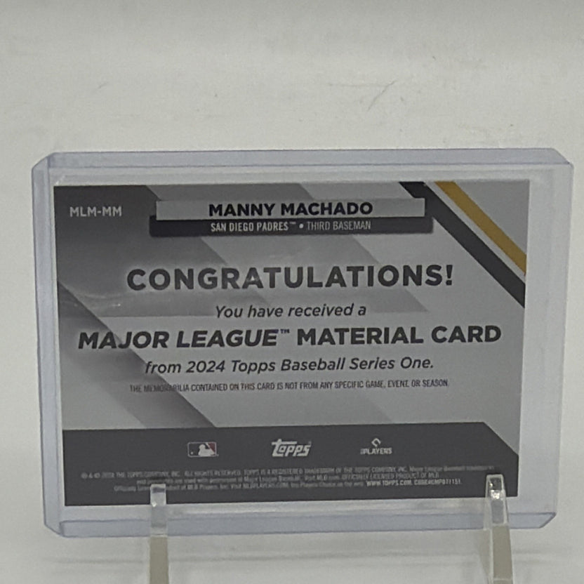 Back of 2024 Topps Series 1 Manny Machado Major League Material #MLM-MM
