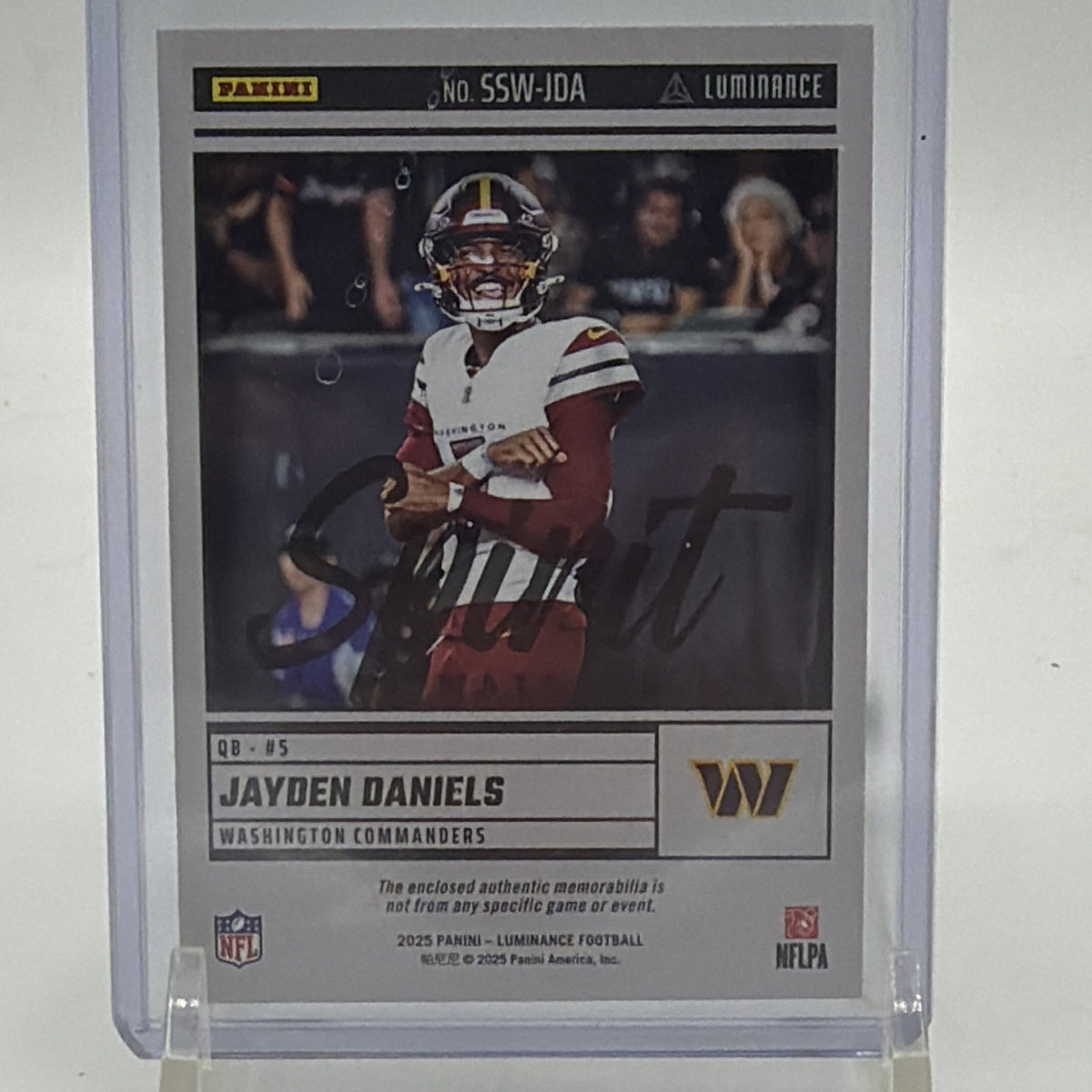 Back of 2025 Panini Luminance Jayden Daniels Spirit Swatches #SSW-JDA