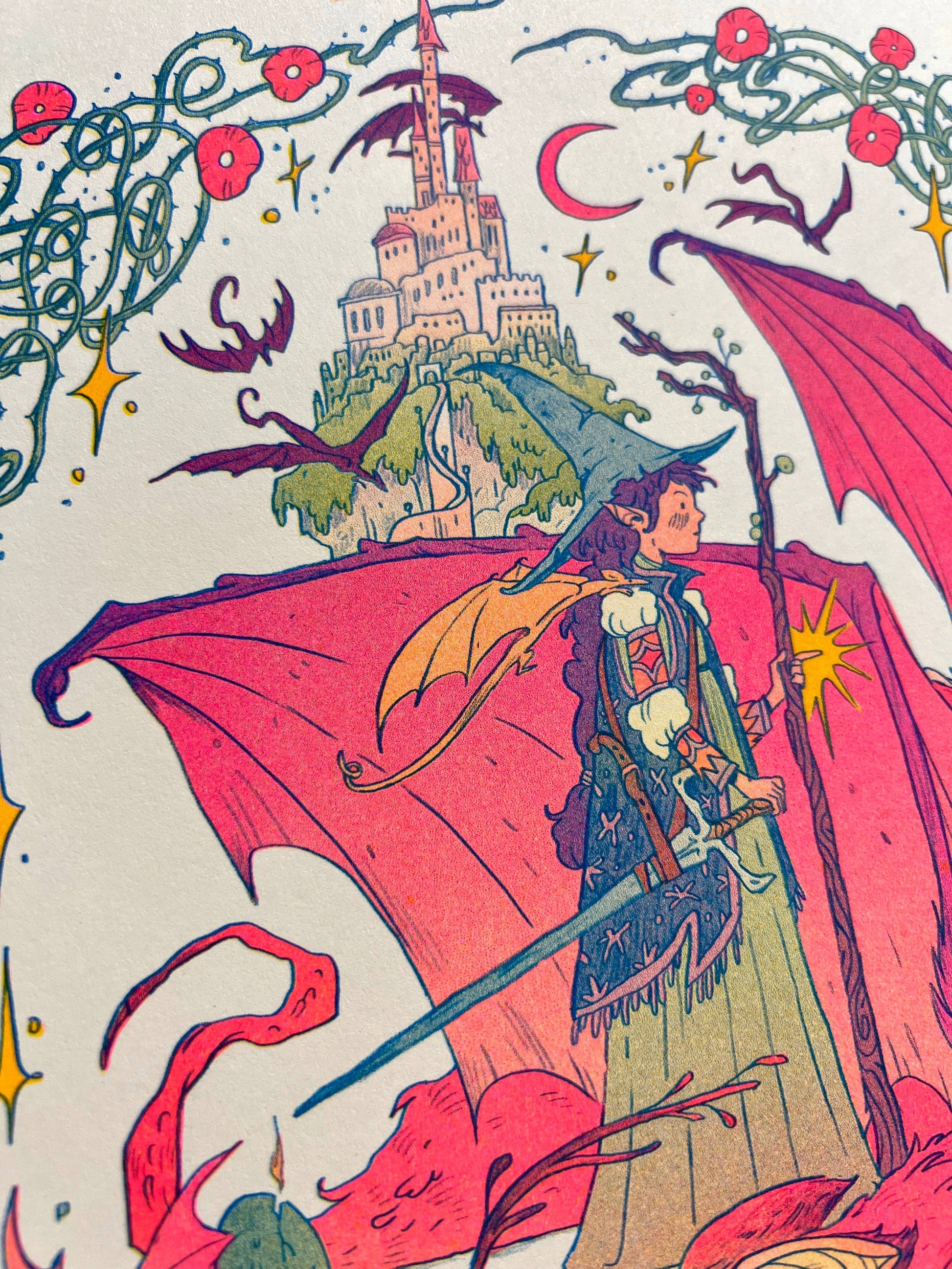 Dragon Witch risograph print, Natalie Andrewson riso print, spooky season witch art, bats as dragons illustration, witch and dragon artwork, Giant Robot Flying Creatures art, blue yellow fluorescent pink riso, whimsical witchy art print, indie printmaker riso, enchanted fantasy artwork, collectible risograph print, Rogue & Rye artist collection.