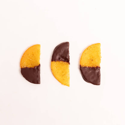 candied oranges in dark chocolate, chocolate-covered oranges, artisan chocolate Portland Oregon, small-batch chocolate, Ranger Chocolate Co., award-winning chocolate 2025, handcrafted chocolate gifts, gourmet citrus chocolate, premium organic cacao, bean-to-bar chocolate Portland, fair trade chocolate treats, holiday chocolate gifts, Rogue and Rye artisan foods, Pacific Northwest chocolate makers, chocolate for gifting, ethical chocolate brands, Portland specialty foods, chocolate dipped fruit, citrus confe