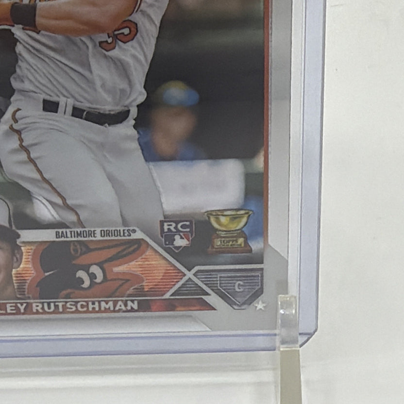 Detail view of Adley Rutschman 2023 Topps Chrome rookie card #1 showing the Orioles nameplate