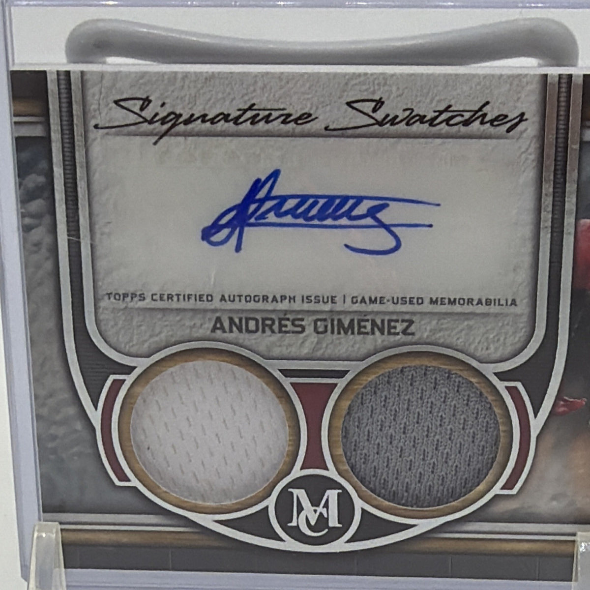 Close-up of Andrés Giménez blue-ink on-card autograph and two memorabilia swatches
