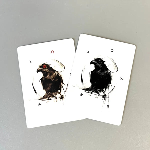 Two Be Like A Crow playing cards featuring detailed black-and-white bird illustrations