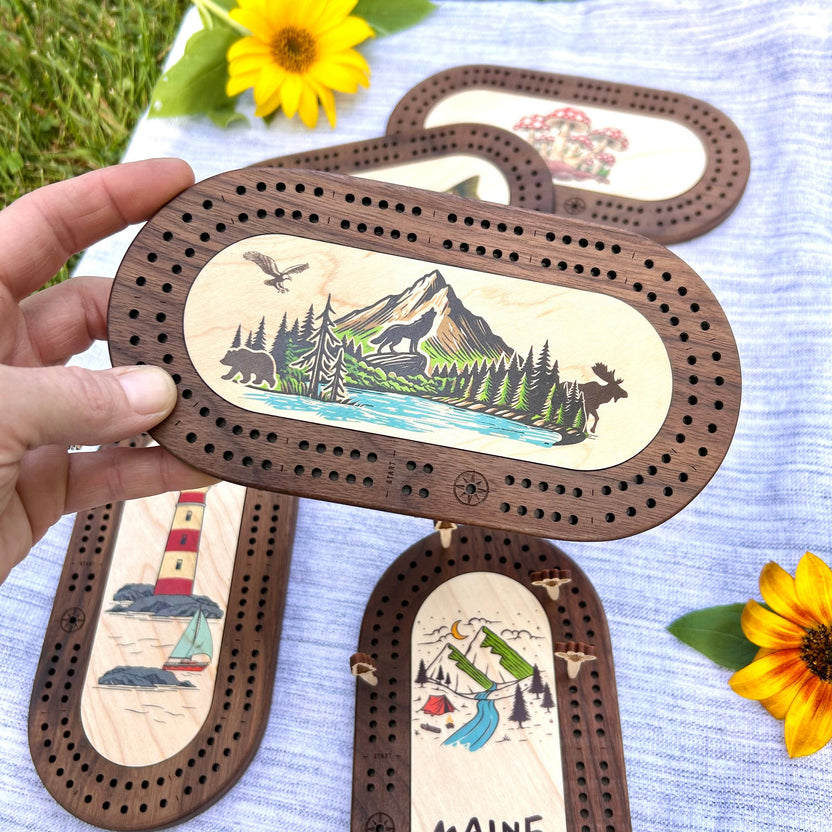 deluxe mini cribbage board, travel cribbage set, wildlife cribbage board, Cast and Carve games, pocket cribbage board, maple walnut game board, custom cribbage pegs, souvenir cribbage board, Maine made gift, eco friendly travel game, camping, hiking