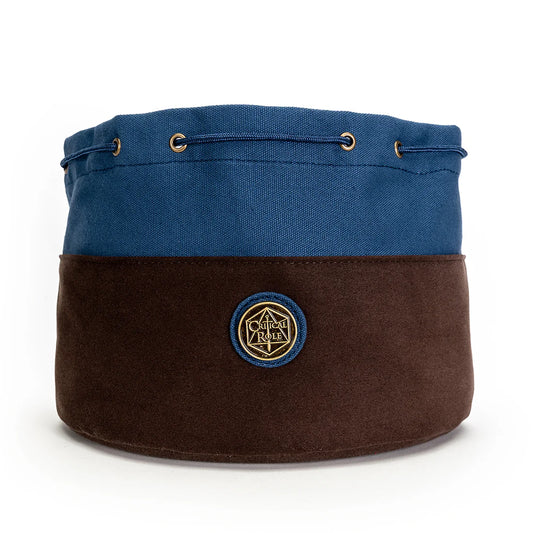 Blue and brown dice bag with the critical role logo on  front a white background