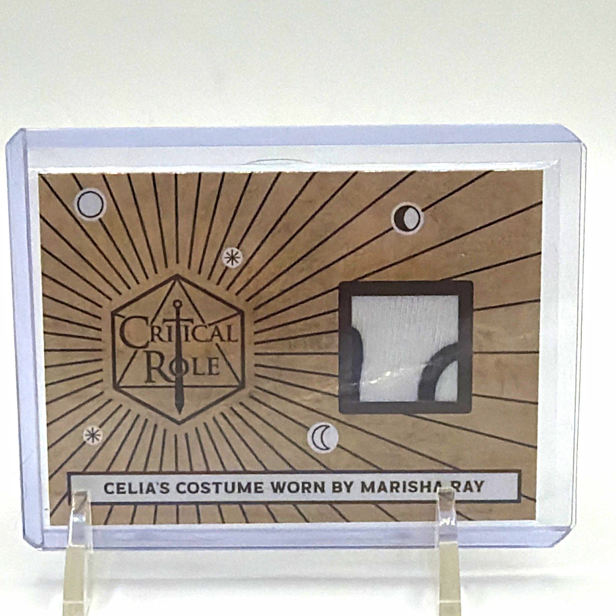 Front of Critical Role 10th Anniversary Celia costume relic card featuring material worn by Marisha Ray