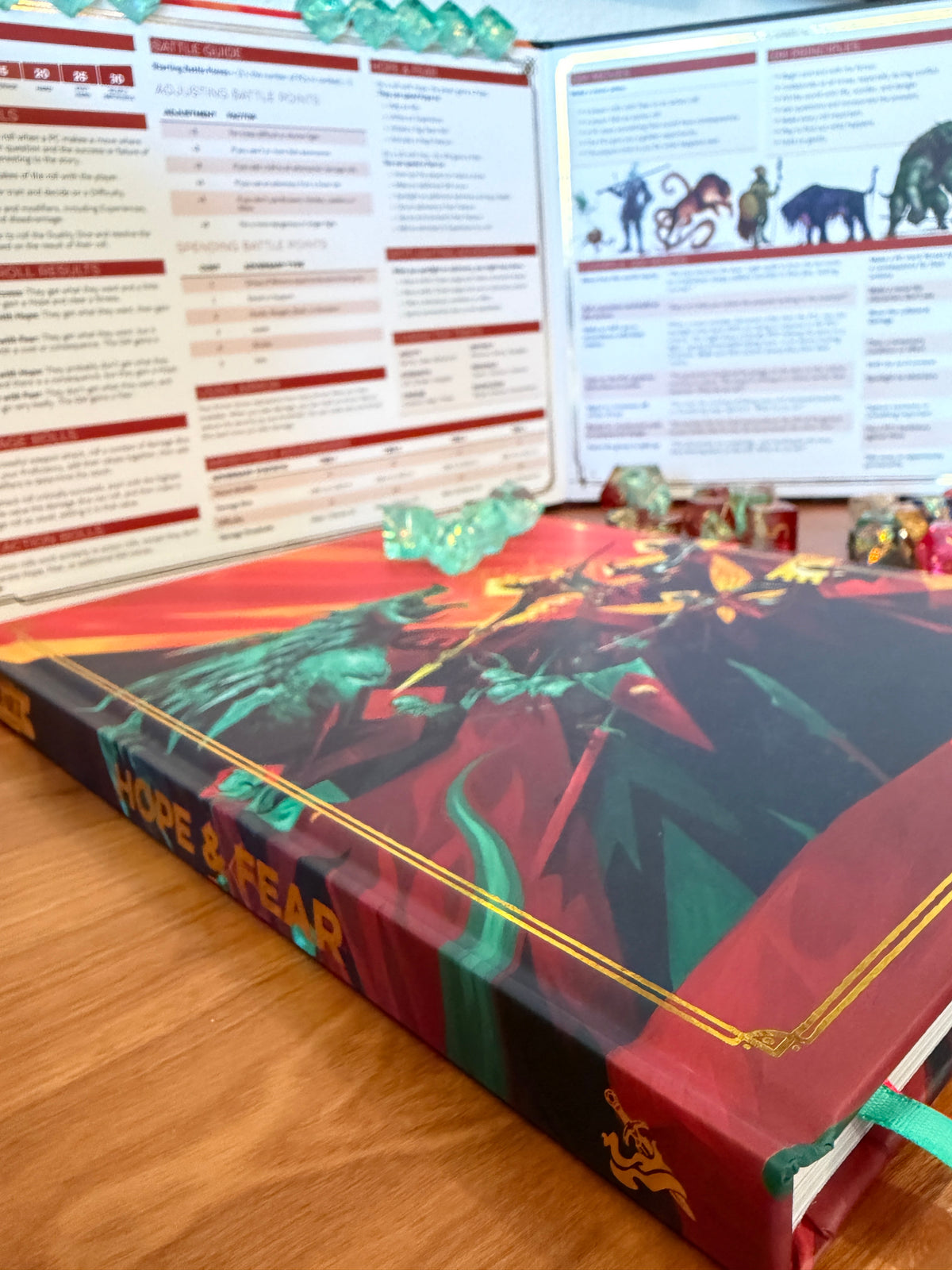 Side view of the Daggerheart Hope & Fear Deluxe Edition collector's box with deluxe GM screen, on-screen Fear Trackers and premium dice displayed behind.
