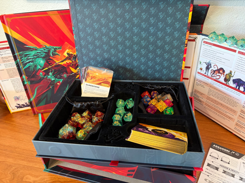 Open Daggerheart Hope & Fear Deluxe Edition showing premium organizer tray, deluxe dice, cards, and collector's accessories.