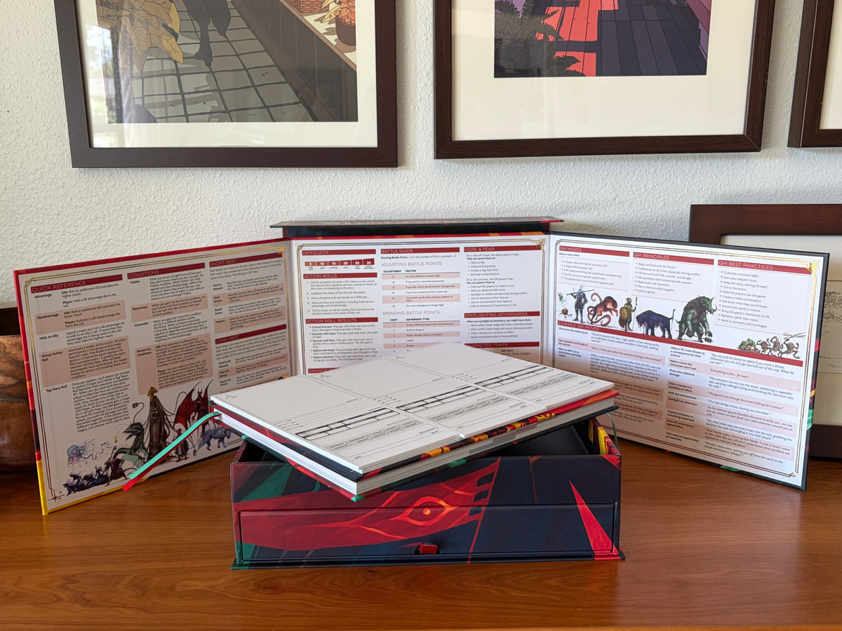 Daggerheart Hope & Fear Deluxe Edition storage box holding character sheets and drawer holding premium game materials.