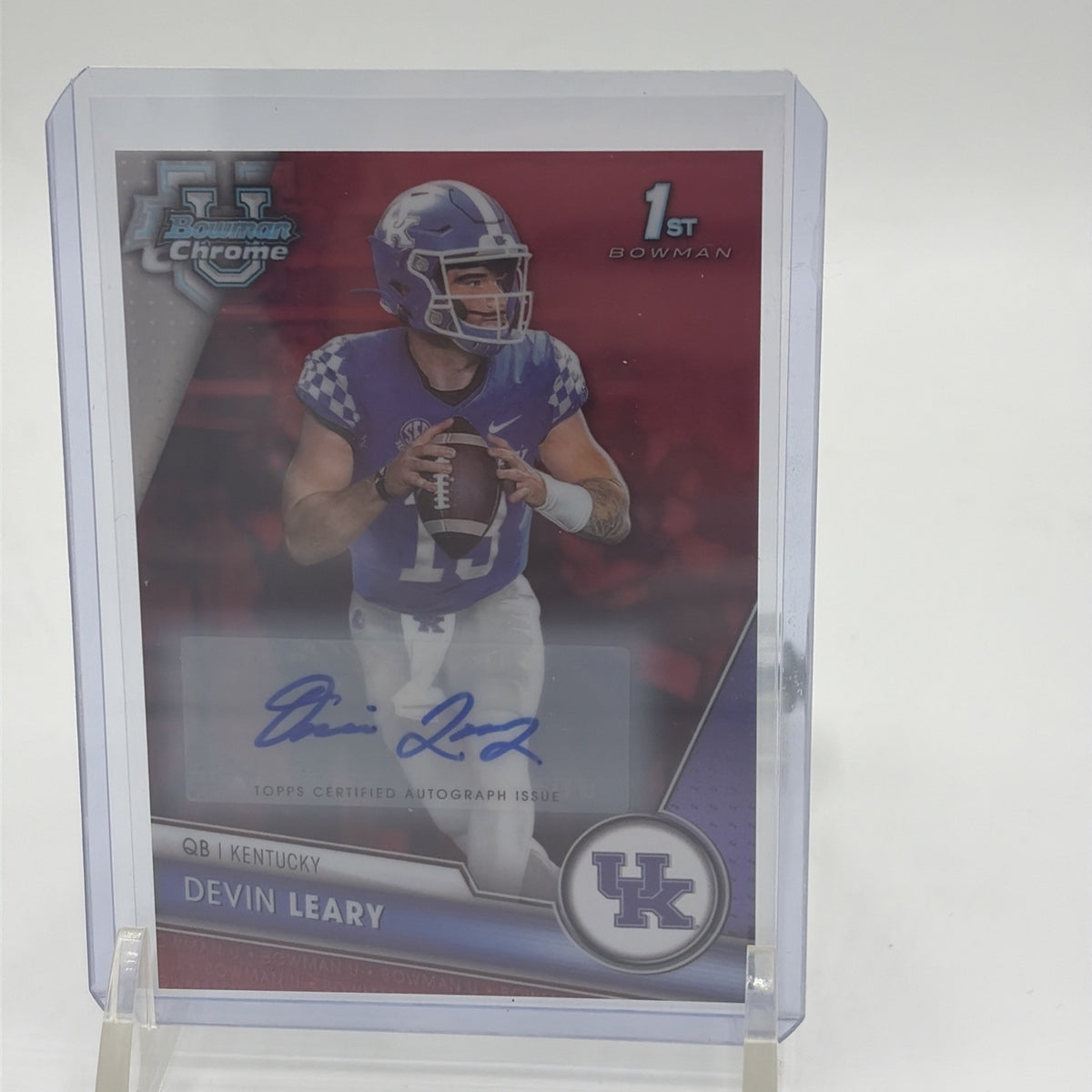 Close-up of Devin Leary 1st Bowman Red Refractor autograph showing blue signature and red Chrome finish