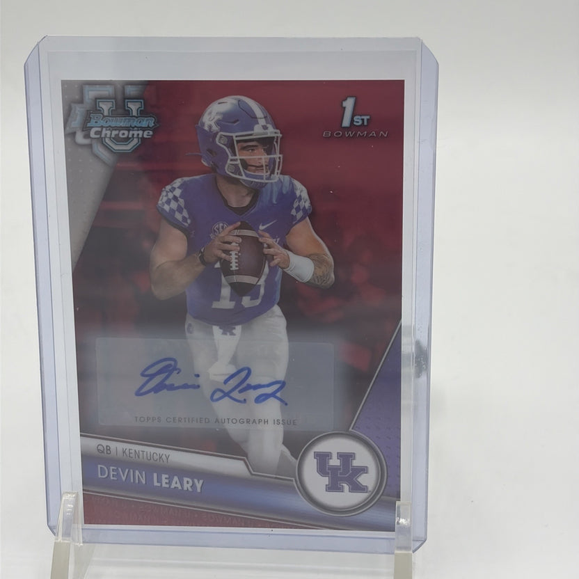 Close-up of Devin Leary 1st Bowman Red Refractor autograph showing blue signature and red Chrome finish
