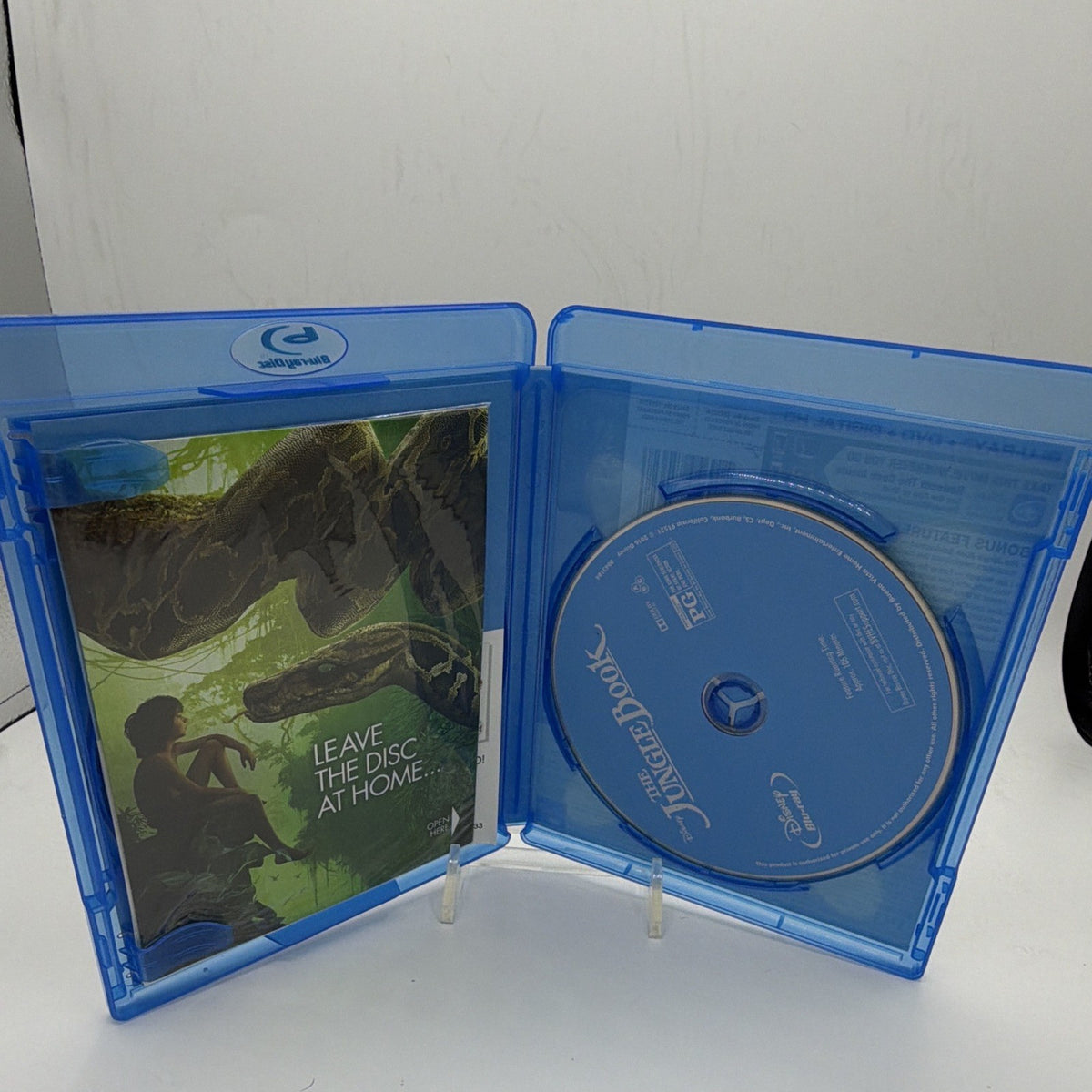 Open Disney The Jungle Book case showing included disc and interior packaging