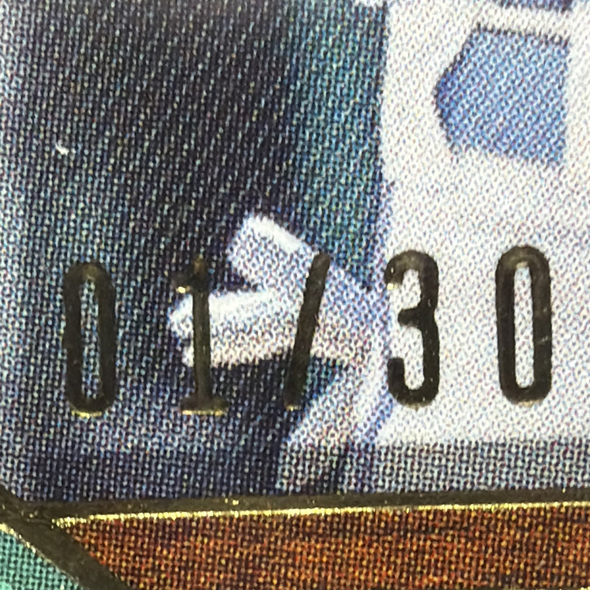 Close-up of the 01/30 serial number on Drew Waters Golden Graphs rookie autograph