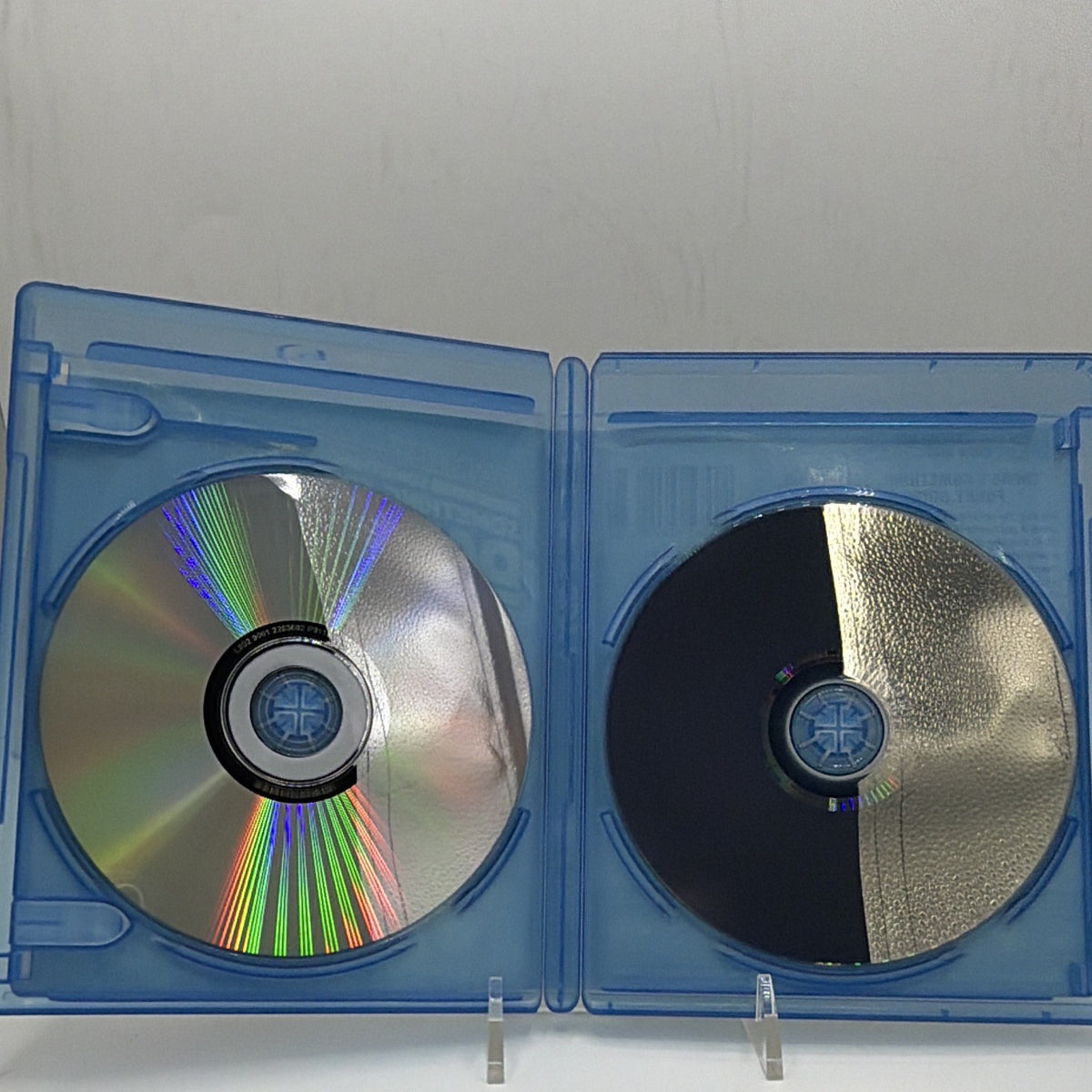 Open Family Guy Something, Something, Something, Dark Side case showing the reflective sides of both included discs