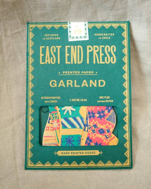 East End Press Festive Stockings Sewn Garland in illustrated packaging
