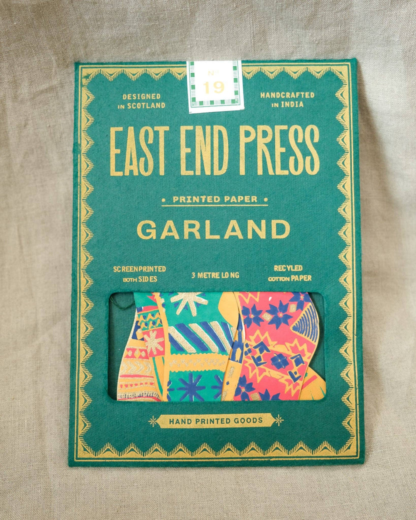 East End Press Festive Stockings Sewn Garland in illustrated packaging