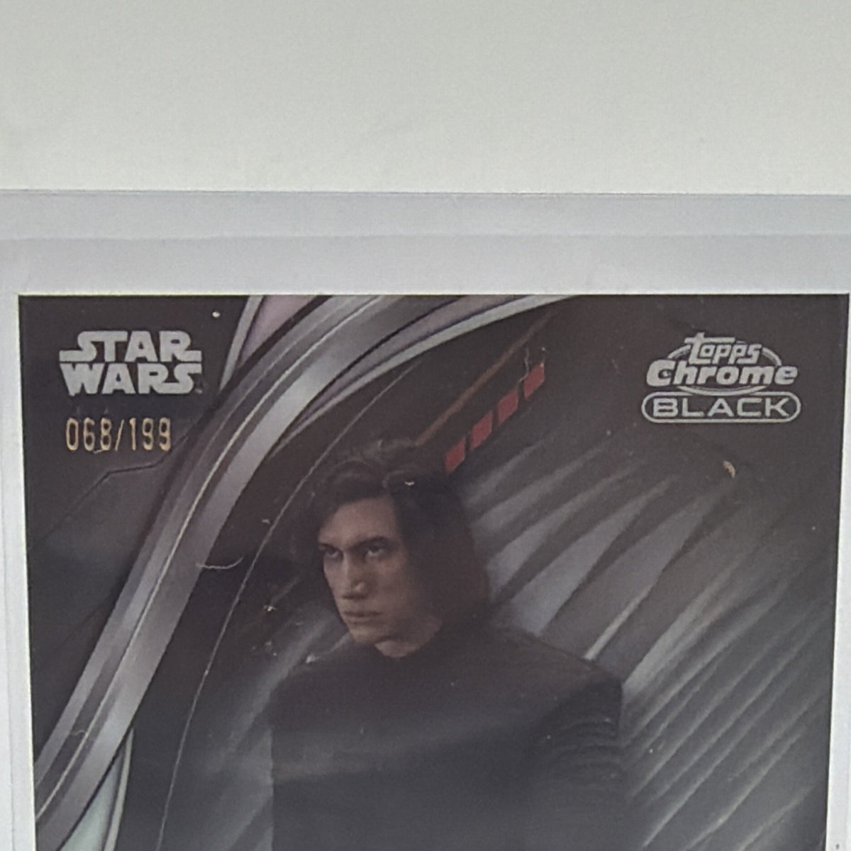 Upper front detail showing Kylo Ren and the Topps Chrome Black Star Wars branding