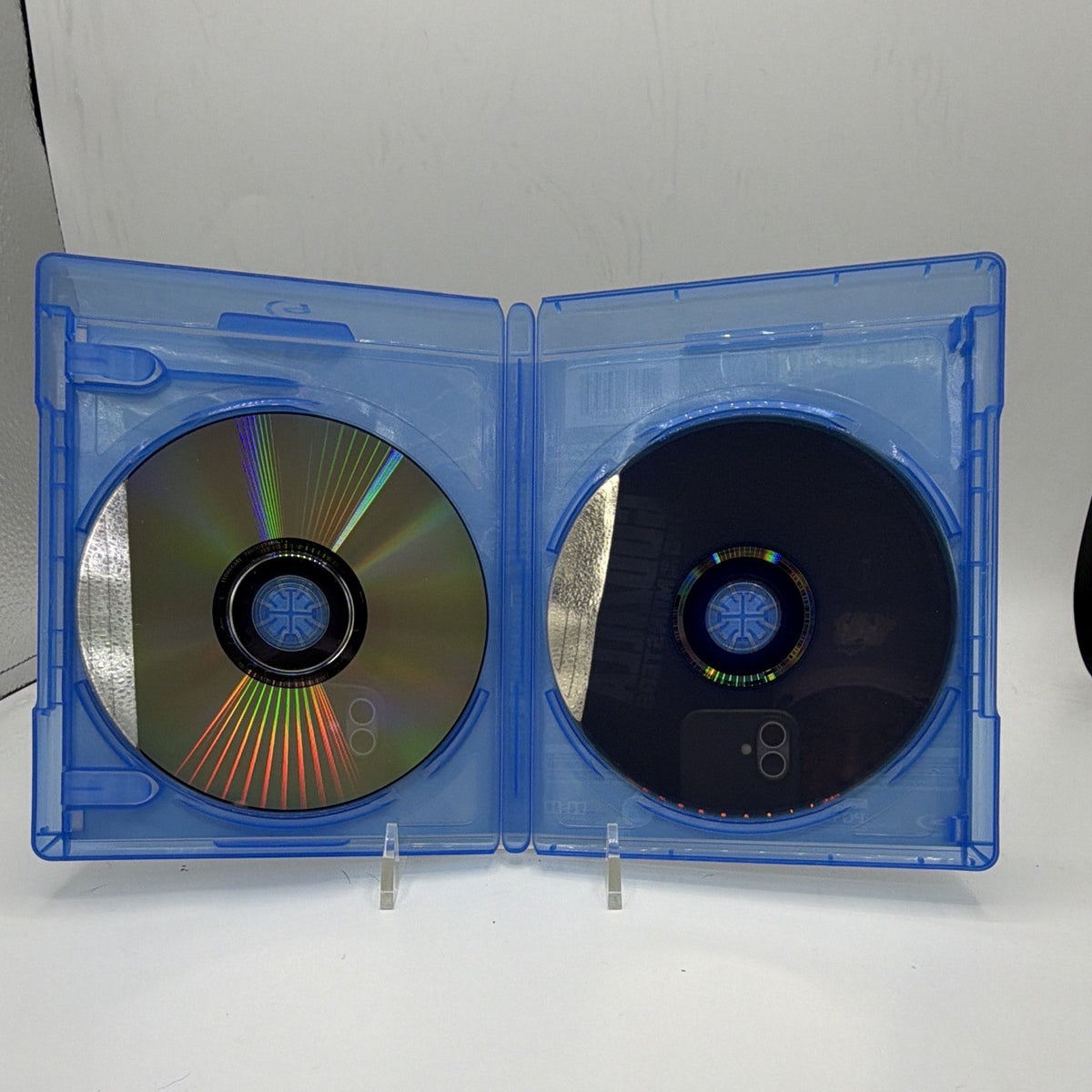 Godzilla: King of the Monsters Blu-ray and DVD discs shown inside the open case