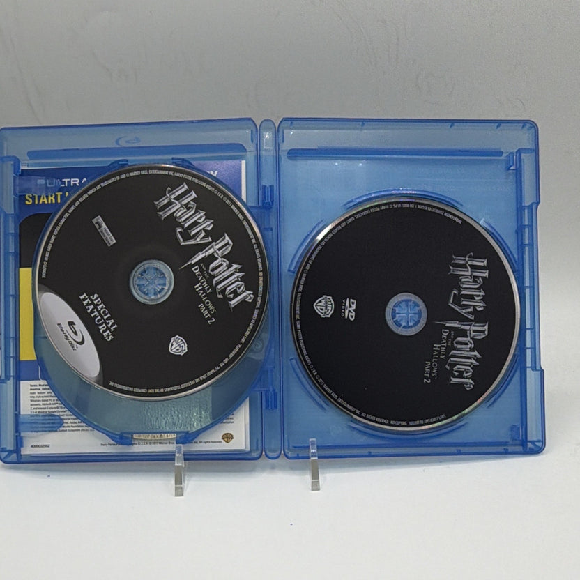 Open Harry Potter and the Deathly Hallows Part 2 case showing both included physical discs