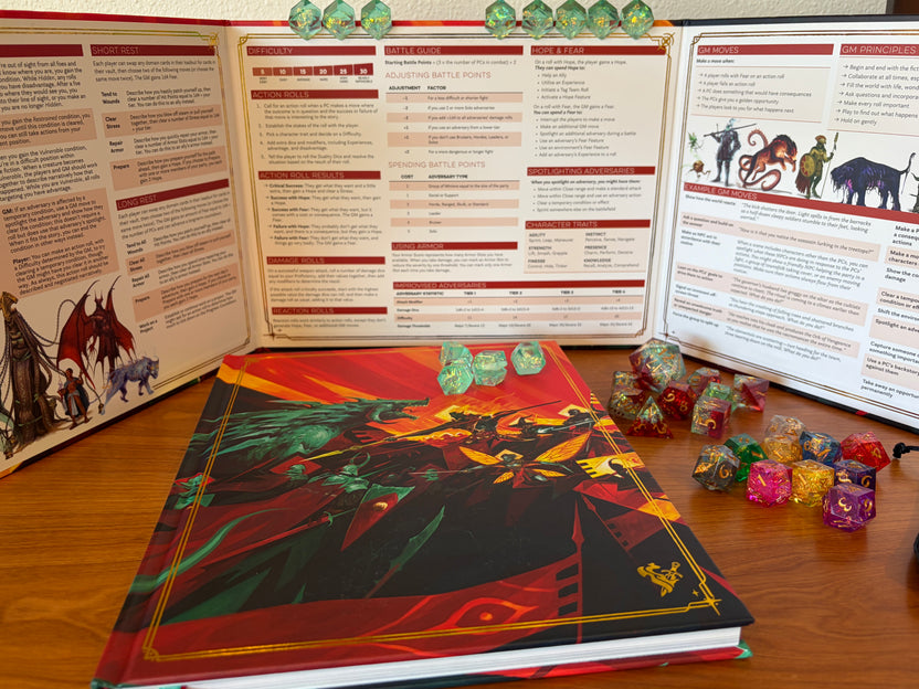 Daggerheart Hope & Fear Deluxe Edition rulebook displayed with the deluxe GM screen, Fear Trackers, and colorful premium dice.