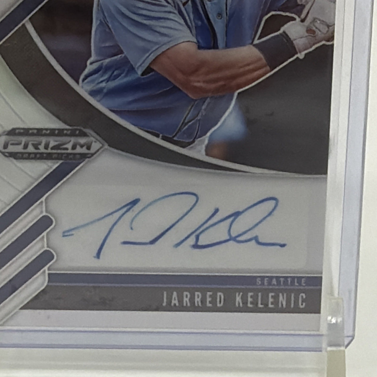 Close-up of Jarred Kelenic 2020 Prizm Draft Picks card showing blue autograph
