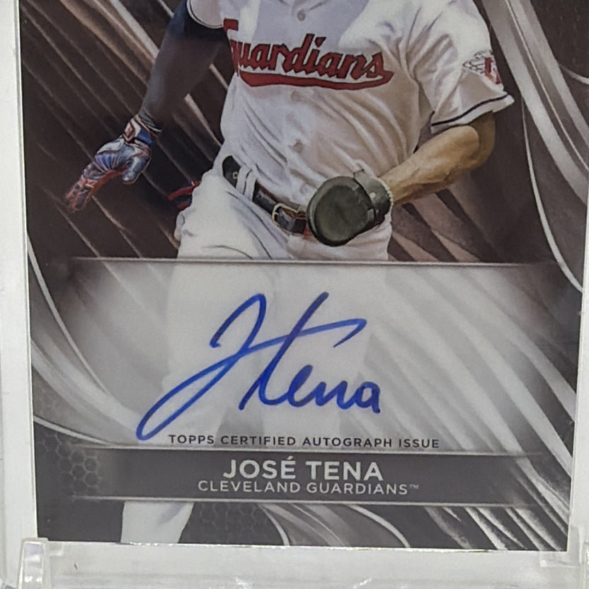 Close-up of José Tena's blue-ink on-card autograph