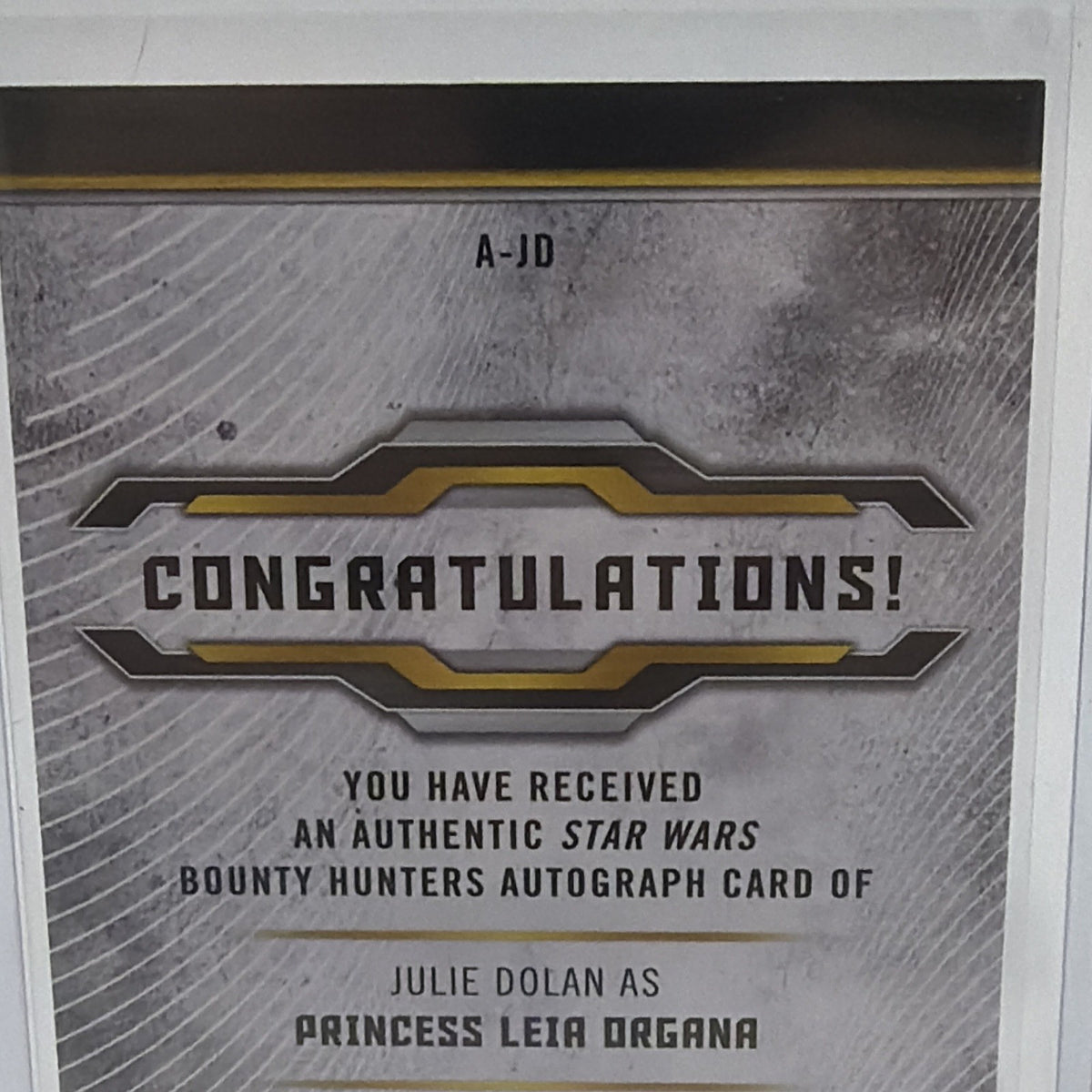 Detail of the back of Julie Dolan Princess Leia Organa autograph card #A-JD