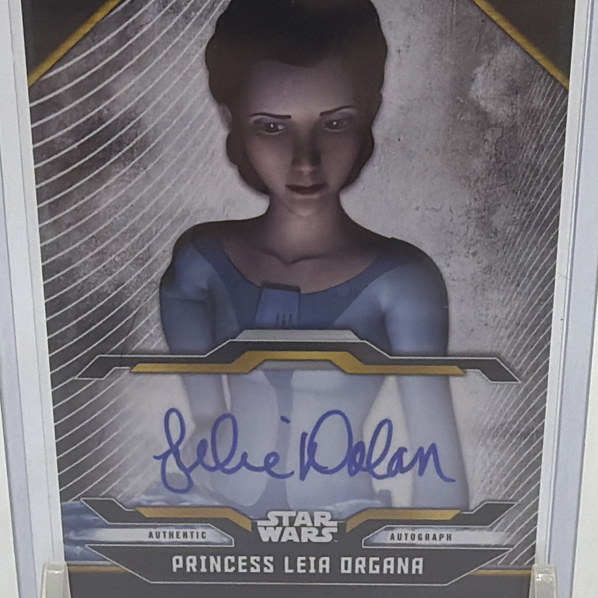 Close-up of Julie Dolan's blue autograph on Princess Leia Organa #A-JD