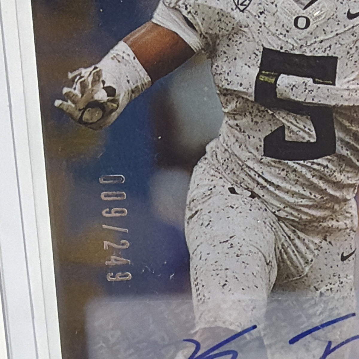 Back detail showing serial number 009/249 on Kayvon Thibodeaux rookie autograph #136