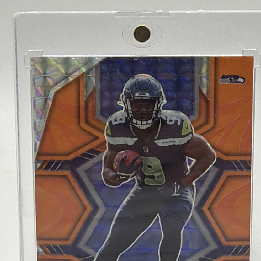 Close-up of Kenneth Walker III rookie #308 with Reactive Orange Mosaic finish