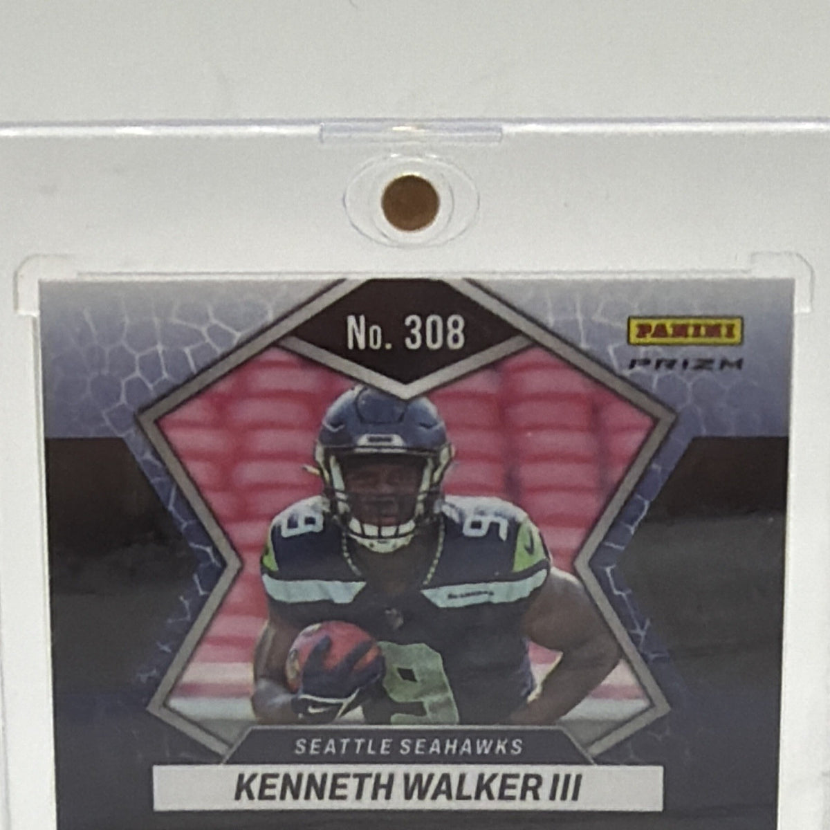 Detail of the back of Kenneth Walker III Mosaic rookie #308