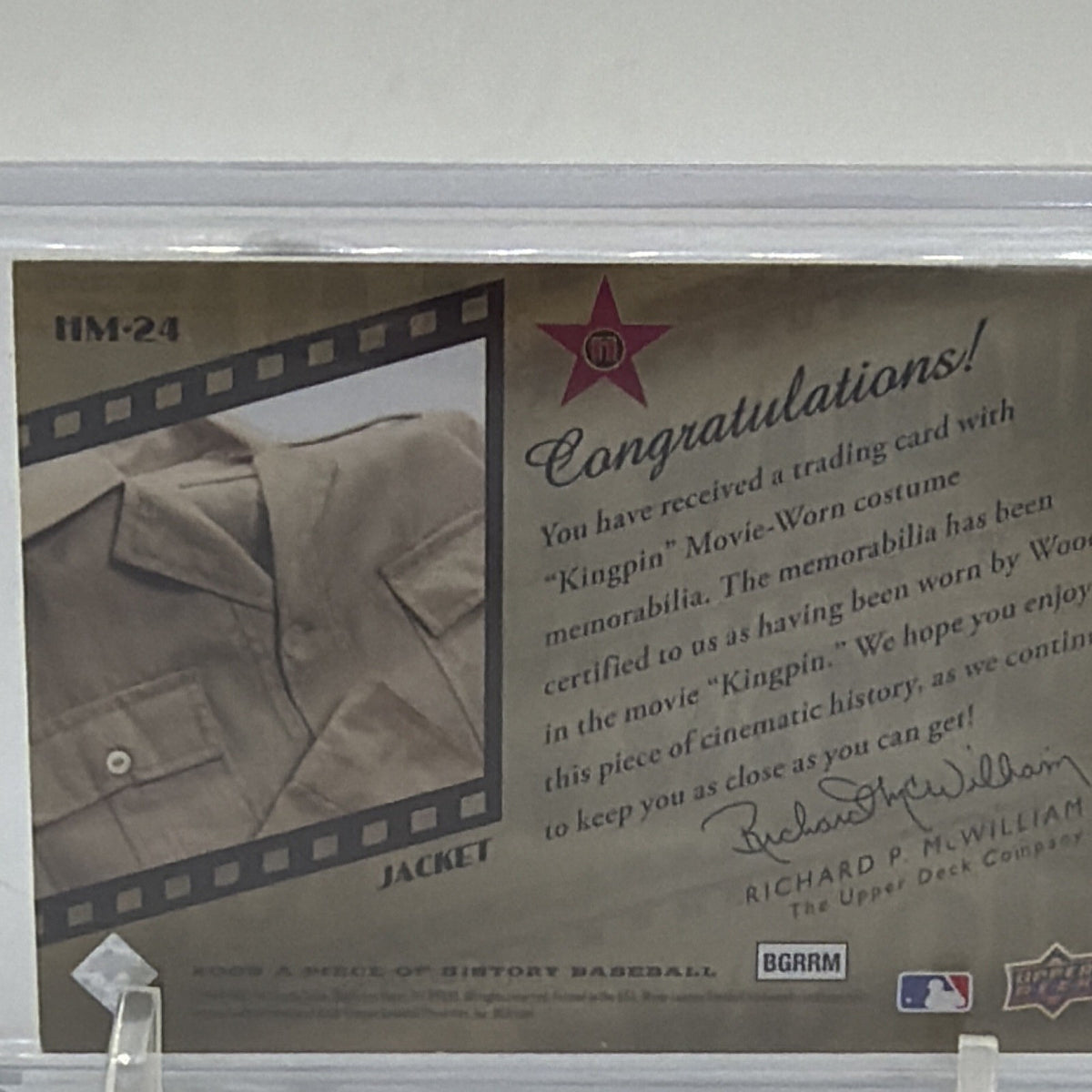 Detail of the reverse of the Kingpin jacket memorabilia card #HM-24