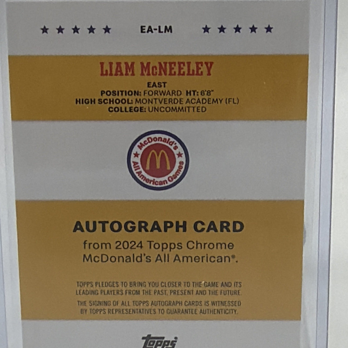 Close-up of Liam McNeeley #30 autograph card back with Topps autograph certification