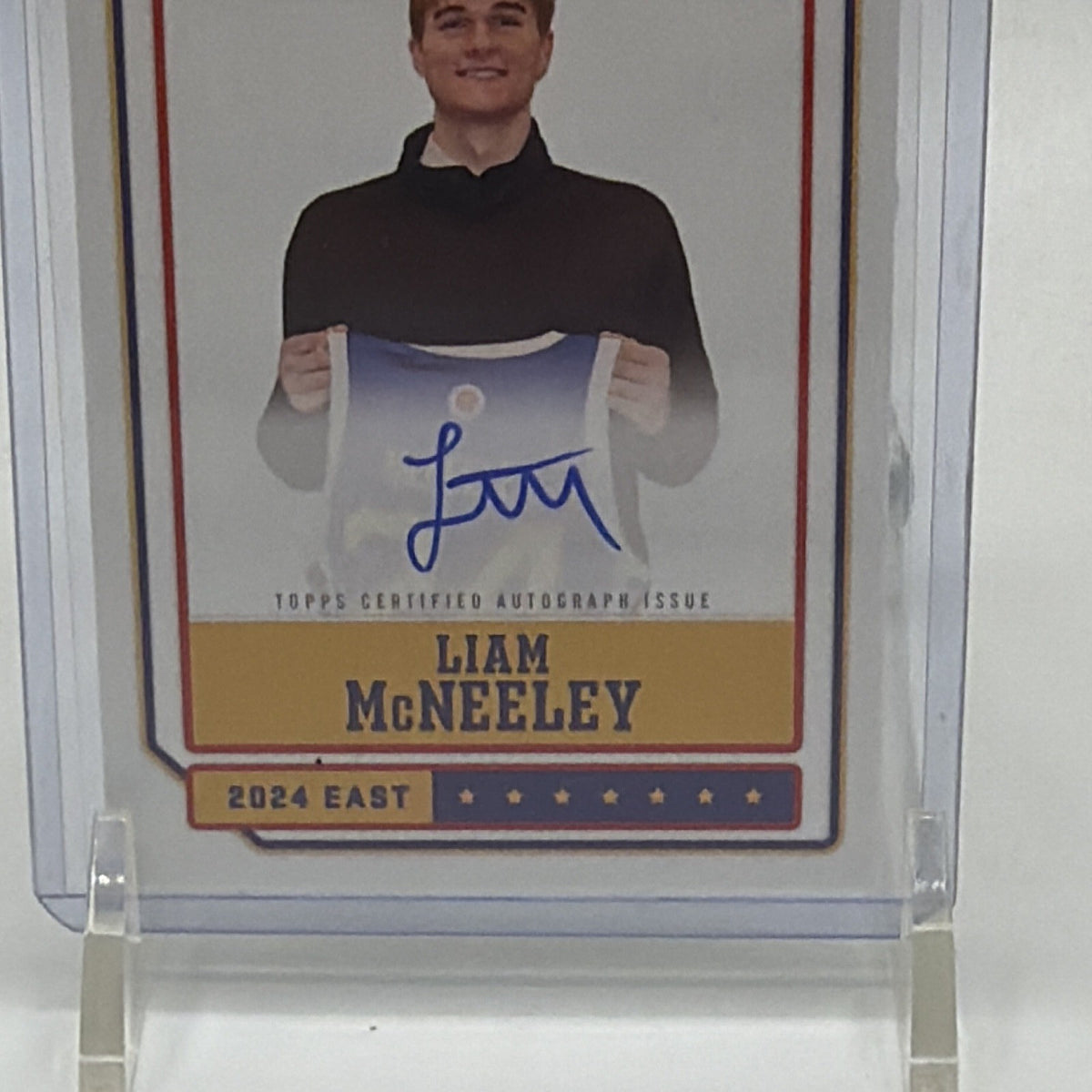 Detailed front view of Liam McNeeley #30 showing blue-ink autograph and McDonald's All American jersey