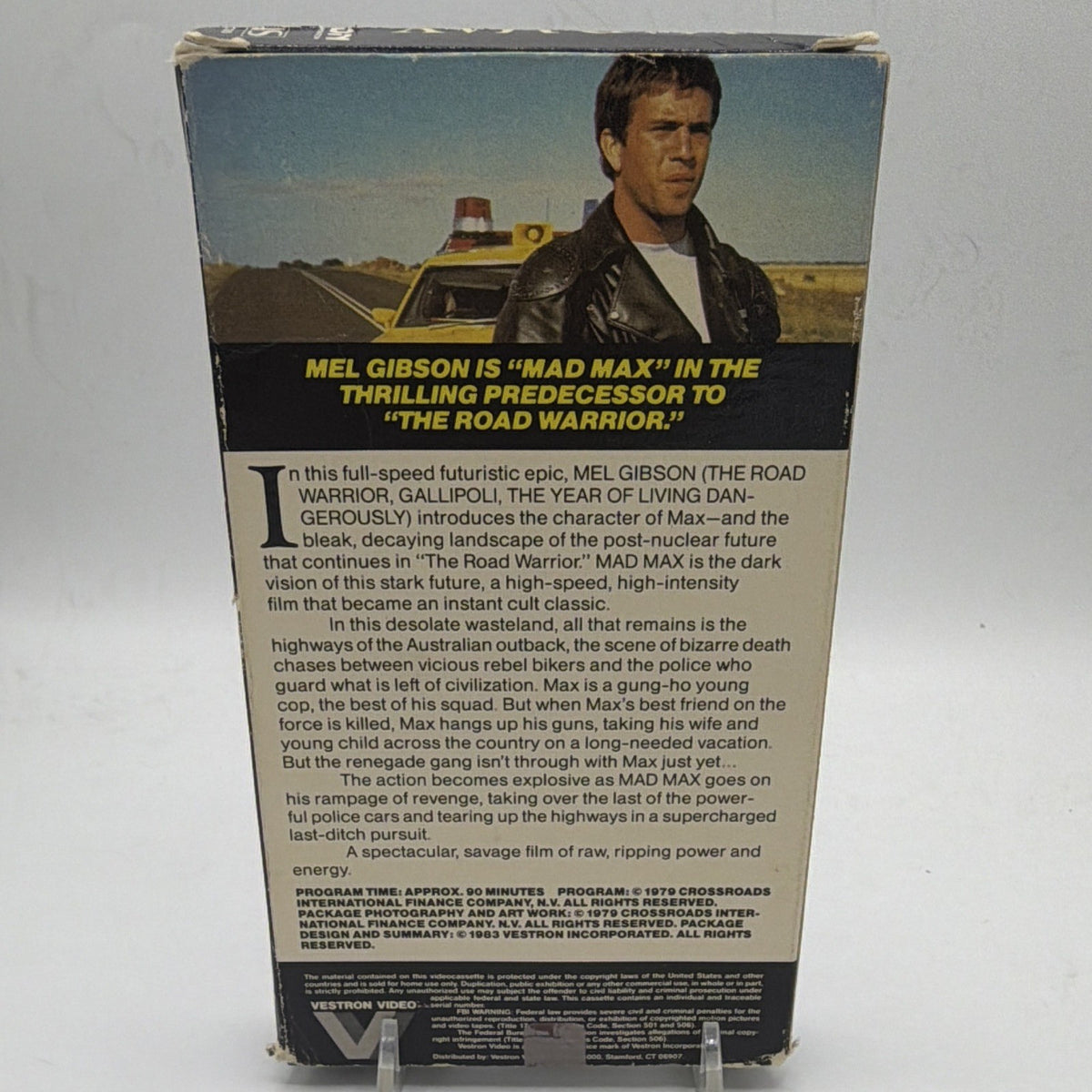Back of Mad Max VHS slipcase with film information and visible wear