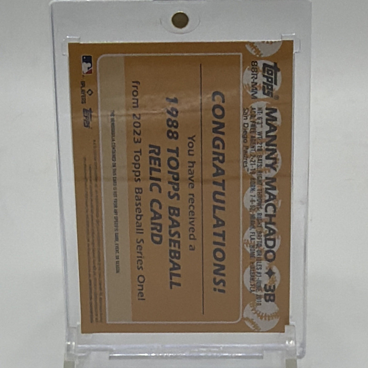 Detail of the back of Manny Machado #88R-MM identifying the game-used memorabilia
