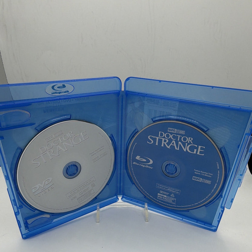 Open Doctor Strange Blu-ray case showing the included Blu-ray and DVD discs