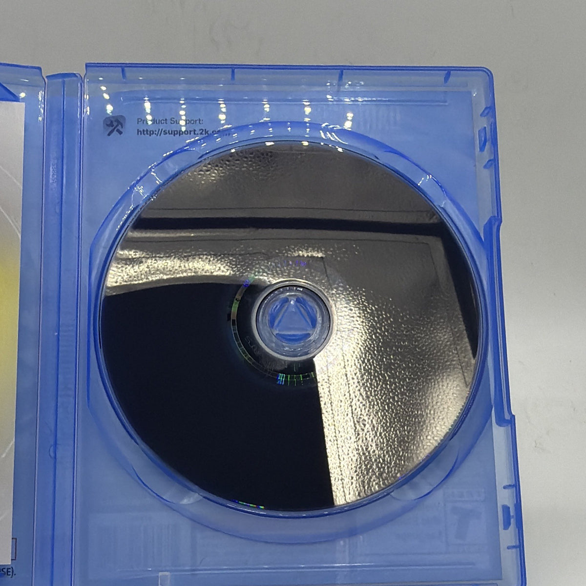 Back surface of the Marvel's Midnight Suns PlayStation 5 game disc