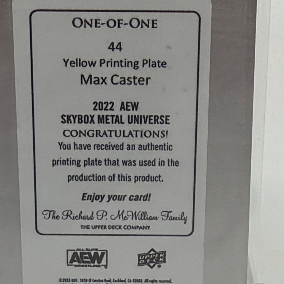 Close-up of the reverse certification on Max Caster Yellow Printing Plate 1/1