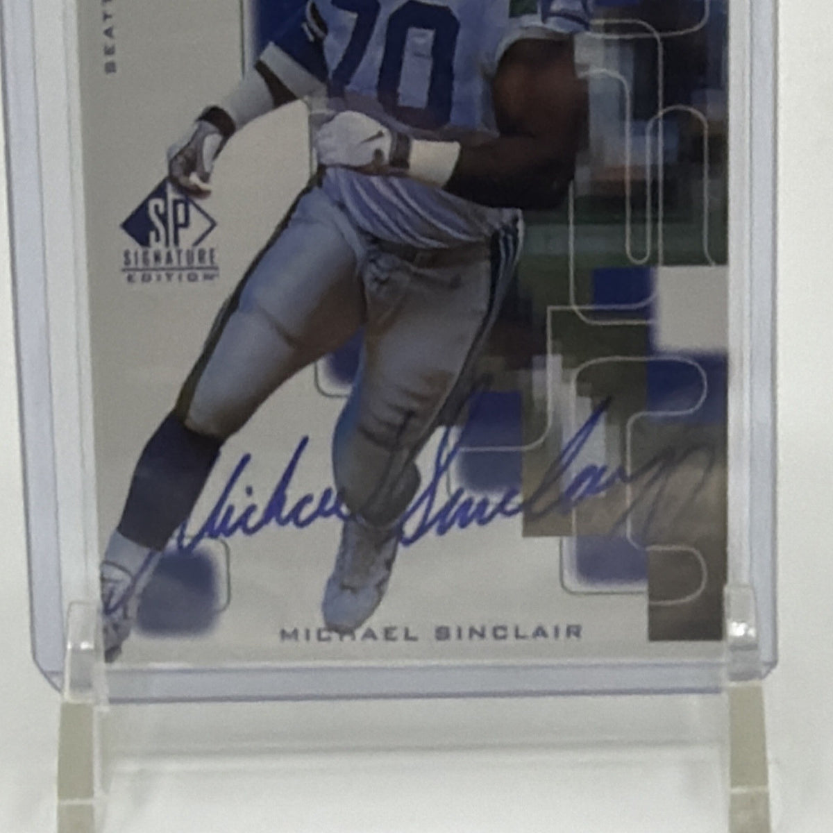 Close-up of Michael Sinclair's blue-ink on-card autograph on 1999 SP Signature #MS