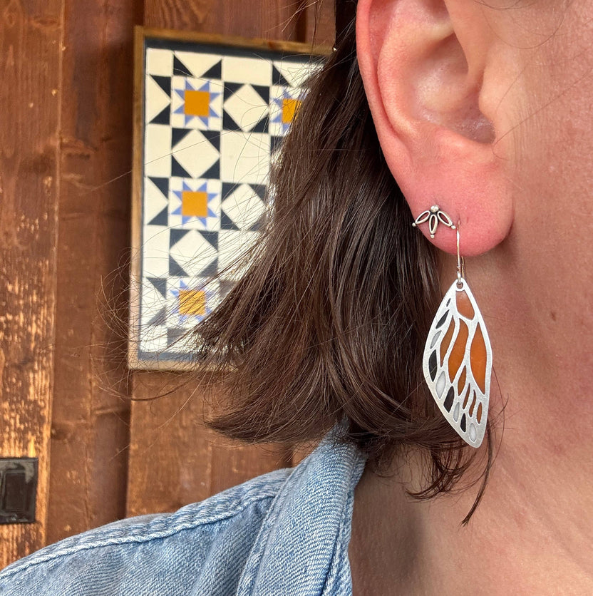 butterfly wing earrings, stained glass resin earrings, lightweight dangle earrings, nature inspired jewelry, butterfly jewelry for women, handmade resin earrings, stainless steel earrings, whimsical fashion accessories, gift for nature lovers, artisan butterfly earrings, unique statement earrings, everyday wear earrings, modern boho earrings, colorful resin earrings, forestcore jewelry, fairycore accessories, spring jewelry trends, handcrafted earrings USA, Rogue & Rye earrings