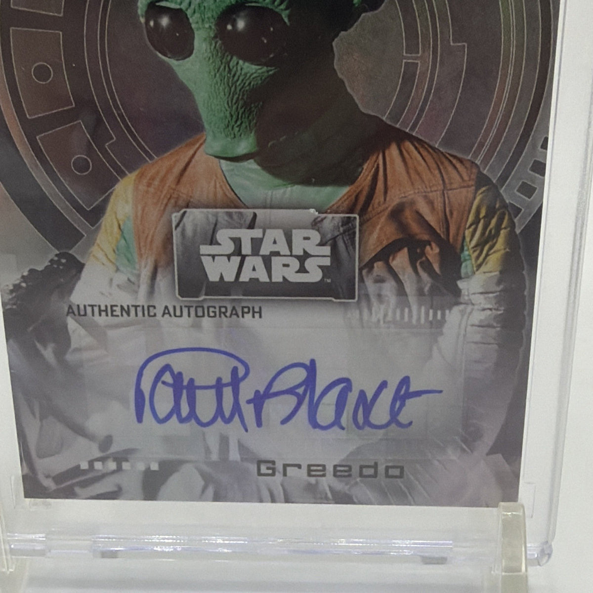 Front detail of Paul Blake as Greedo Star Wars autograph card showing the blue-ink signature