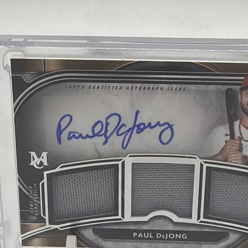 Front detail of Paul DeJong Museum Collection autograph with three memorabilia swatches