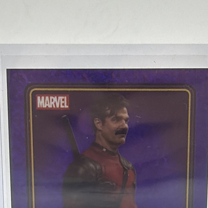 Front detail of Rob Delaney as Peter on 2025 Topps Chrome Deadpool #23 Purple Wave