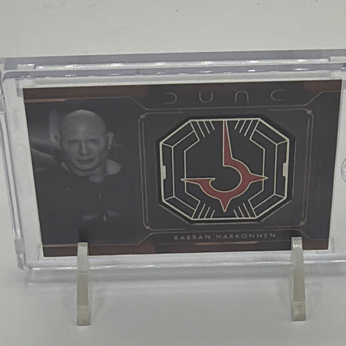 Close-up of the House Harkonnen medallion on Rabban Harkonnen #MCM-GH