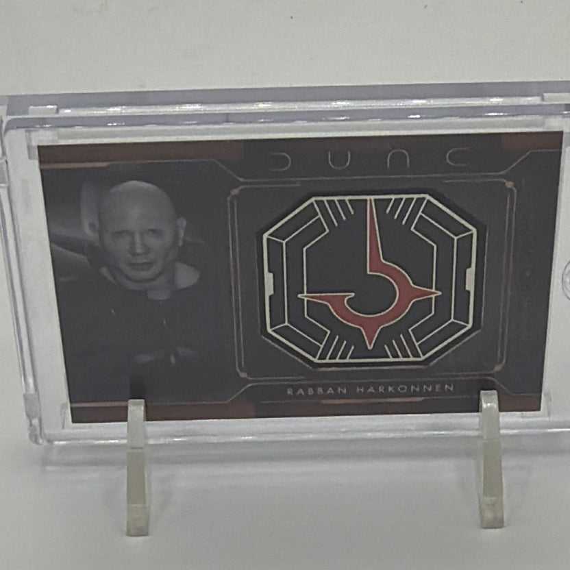 Close-up of the House Harkonnen medallion on Rabban Harkonnen #MCM-GH