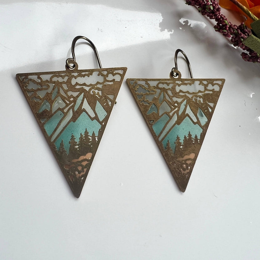 Ridgeline earrings, stained glass resin earrings, mountain earrings, landscape earrings, brass dangle earrings, nature-inspired jewelry, scenic resin earrings, handcrafted earrings, artisan mountain earrings, lightweight statement jewelry, outdoorsy earrings, Rogue & Rye earrings, hiking gift idea, wilderness inspired earrings, colorful scenic jewelry, everyday art jewelry, handmade mountain landscape earrings, adventure style accessories, modern nature earrings, gift for outdoor lovers, boho