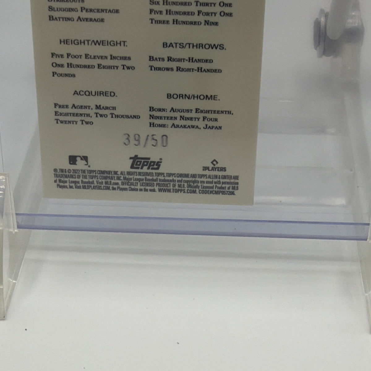 Close-up of Seiya Suzuki #235 Gold Refractor card back showing serial number 39/50