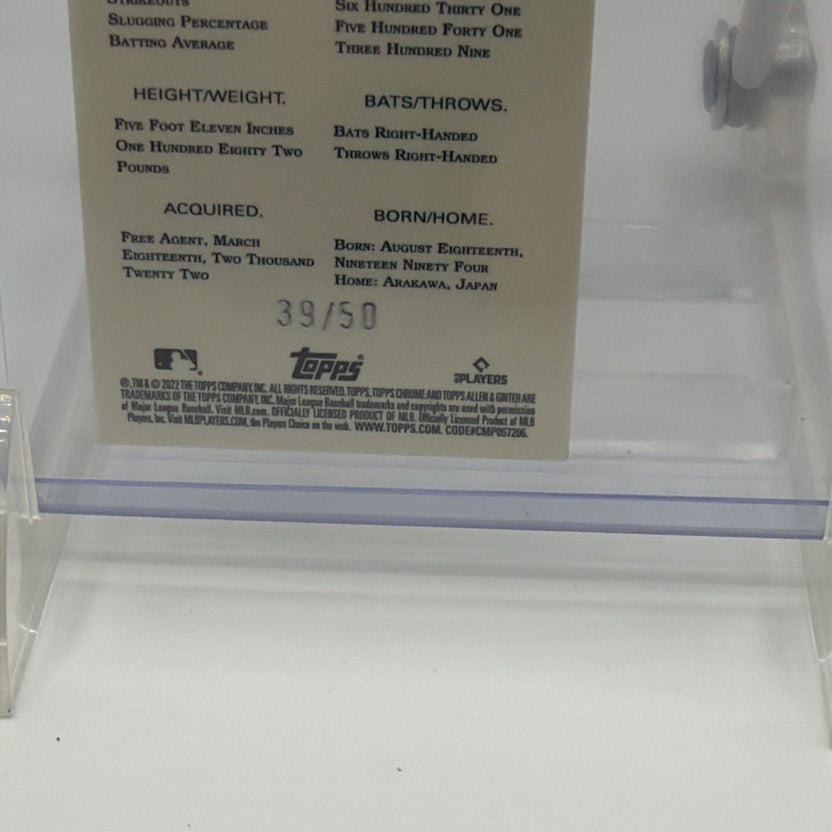 Close-up of Seiya Suzuki #235 Gold Refractor card back showing serial number 39/50