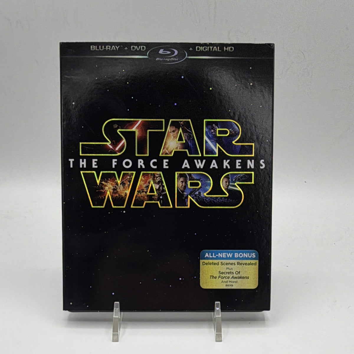 Front of pre-owned Star Wars: The Force Awakens Blu-ray and DVD 3-disc Collector's Edition